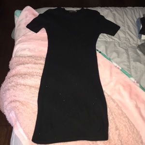 black dress with small slit in front